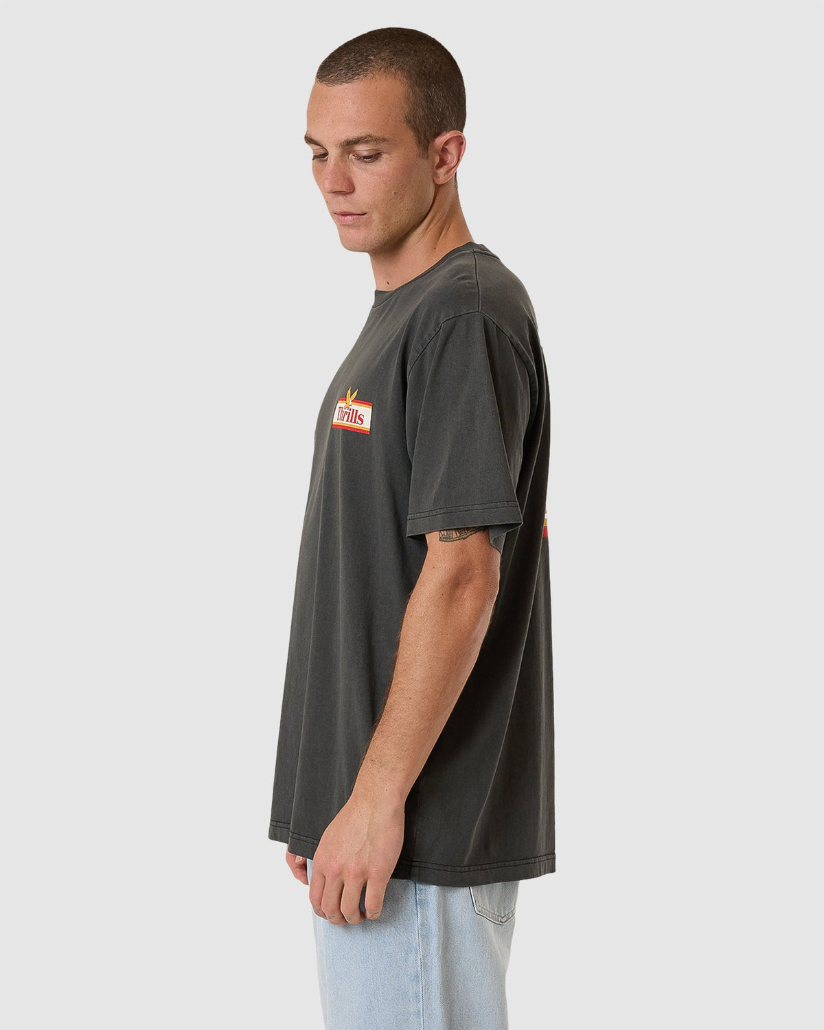 MENS NEVER STOP MERCH FIT TEE