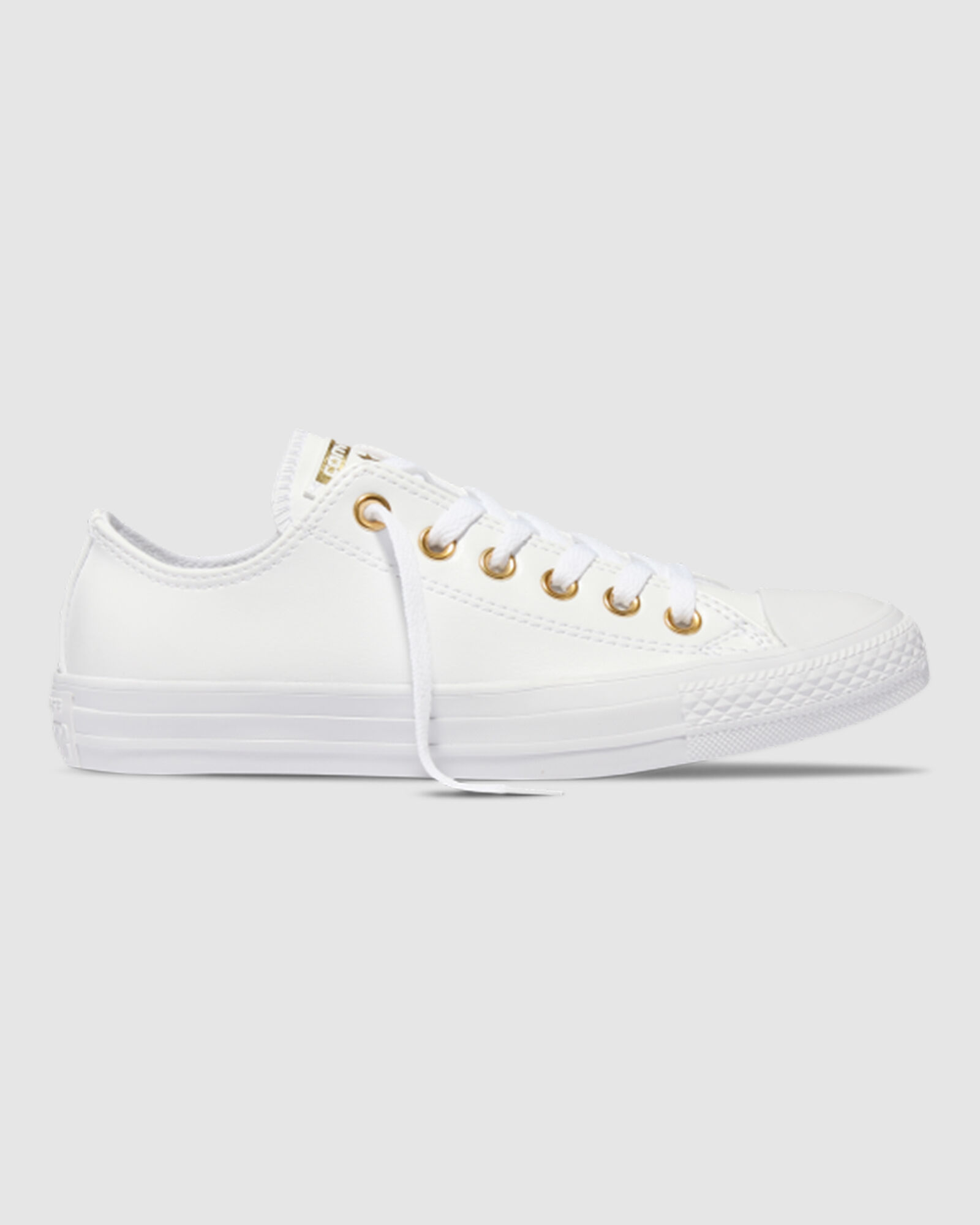 white and gold high top converse